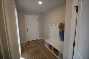 Mudroom with light wood-type flooring