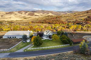 Drone / aerial view with a rural view and a mountain view