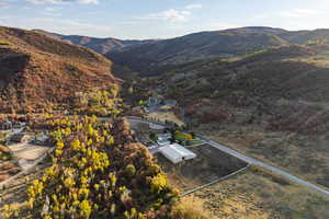 Birds eye view of property featuring a mountain view