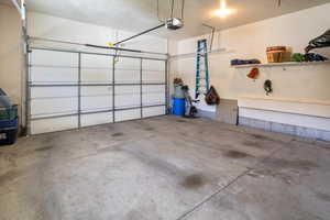 Garage featuring a garage door opener