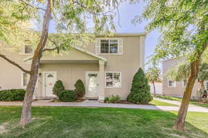 View of front of house featuring a front lawn