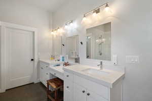 Bathroom with vanity and walk in shower