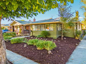 bungalow home with an enclosed porch