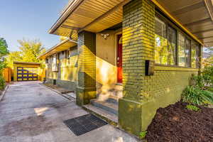 View of entrance to property - Mother-in-law access back by the garage