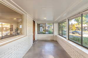 View of enclosed sunroom/porch