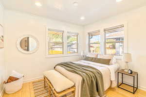 Main level bedroom #1 with bamboo flooring