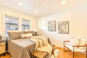 Main level bedroom #2 with light bamboo flooring