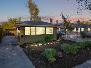 View of front of property with a garage