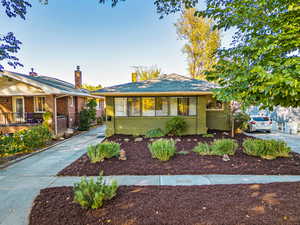 Bungalow home featuring a porch and off road parking