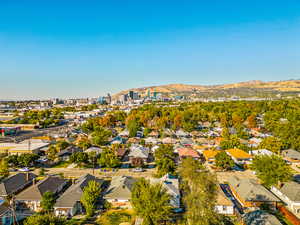 Birds eye view of property with a mountain view