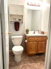 Bathroom with vanity and toilet