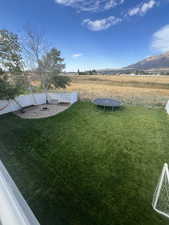 View of yard featuring a mountain view and a rural view