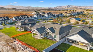 Drone / aerial view featuring a mountain view