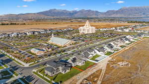 Aerial view featuring lake and mountain views