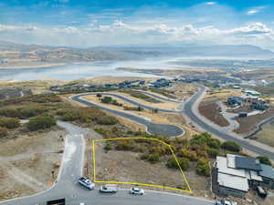 Drone / aerial view with a water and mountain view