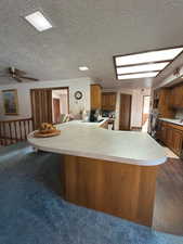 Large sit-around kitchen peninsula with under counter storage.