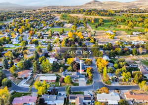 Birds eye view of property featuring a mountain view.