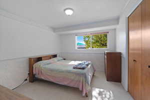 Upper level bedroom large double closets. Adjacent to primary suite.