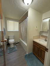 Lower level full bathroom across from bedrooms and family room.