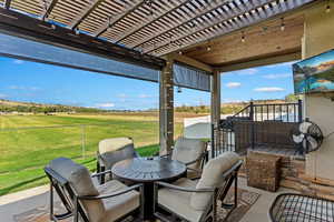 View of patio featuring a pergola