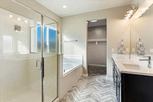 Bathroom with separate shower and tub and vanity