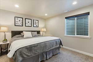 View of carpeted bedroom