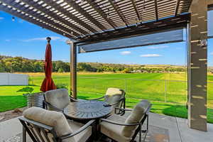 View of patio / terrace featuring a pergola