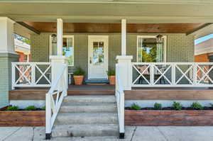 Doorway to property with a porch