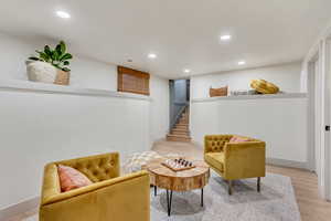 Living area featuring light hardwood / wood-style flooring