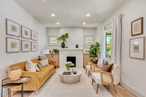 Living room with light wood-type flooring