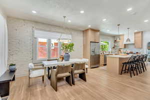 Dining room with light wood-type flooring