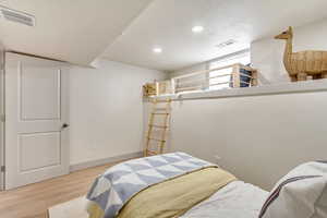 Bedroom featuring light hardwood / wood-style floors