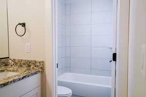 Bathroom with vanity and toilet