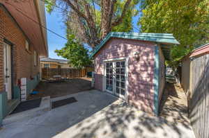 Exterior space with an outbuilding