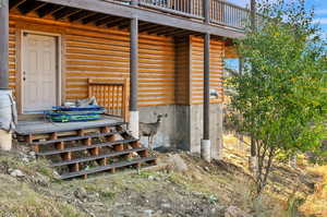 Entrance to property with a deck