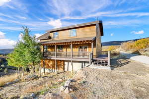 View of front of house with a mountain view