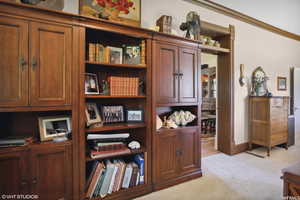 Interior space featuring crown molding