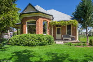 Exterior space featuring a front yard and a porch