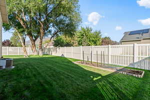 View of yard with cooling unit