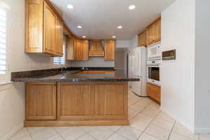 Kitchen with built in oven and microwave