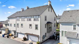 Rear view of house featuring a garage