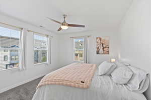 Master Bedroom with ceiling fan and carpet