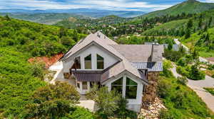 Exterior space featuring a mountain view