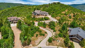 Birds eye view of property featuring a mountain view