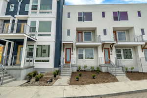 View of property featuring stucco siding