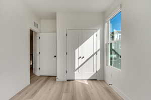 Interior space with light hardwood / wood-style flooring