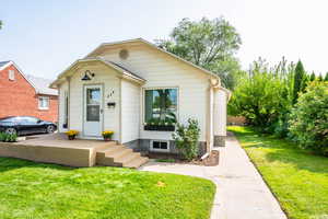 View of front of house with a front lawn