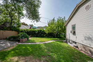 View of yard with cooling unit