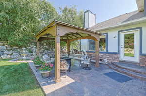 View of patio / terrace featuring a gazebo