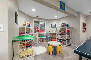 Playroom featuring carpet